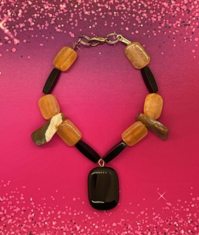 Wrist Bracelet- Polished Stone Chips. Kyanite Beads. Black Four-Sided Acrylic Tube Beads. Approx. length: 8 inches. Pronounced: NAH-yah Origin: Igbo Meaning: Give Me Love