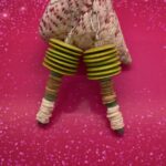 Earrings- Green Wood Discs. Cat's Eye Glass Rondelle Beads. Tan and White Ocean Shell Beads. Square Silver Metal Bead Accents. Approx. length: 2 1/2 inches. .925 Sterling Silver Earwire. Pronounced: foo-RAH-hah Origin: African Meaning: Delight