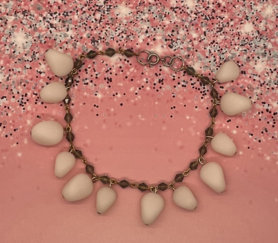 Ankle Bracelet- Transparent Blue Czech Crystal Bicone Beads. Frosted Teardrop Puffed Acrylic Beads. Approx. length: 10 inches. Pronounced: lan-DAH Origin: Zulu Meaning: White Sea Bird