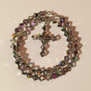 Classic Crystal Cross Necklace- Large Crystal Bicone Beads. Approx. length: 24 inches. Approx. length of Attached Cross is 2 1/4 inches
